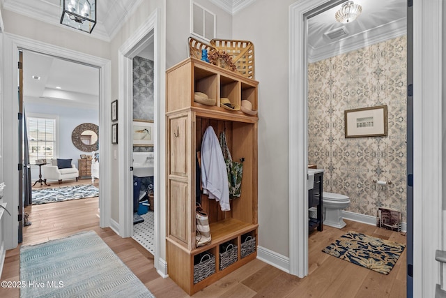 5151 Creswell Dr, Leland, NC 28451 - mudroom with wood finished floors, baseboards, and ornamental molding