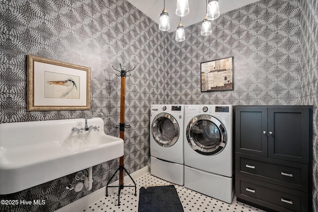 5151 Creswell Dr, Leland, NC 28451 - washroom with separate washer and dryer, cabinet space, wallpapered walls, and baseboards