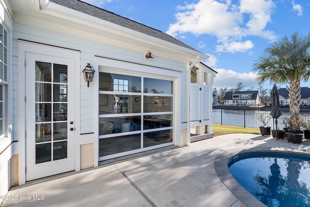 5151 Creswell Dr, Leland, NC 28451 - view of swimming pool with a patio and a water view