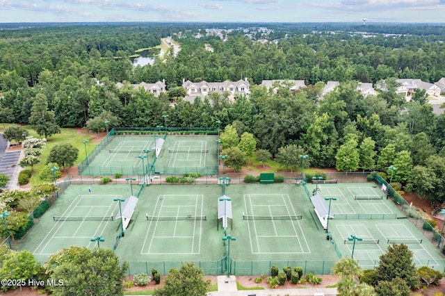 5151 Creswell Dr, Leland, NC 28451 - view of tennis court featuring a forest view