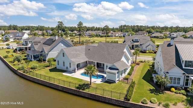 5151 Creswell Dr, Leland, NC 28451 - aerial perspective of suburban area with a pool and a nearby body of water