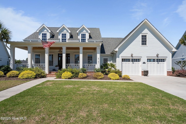 5151 Creswell Dr, Leland, NC 28451 - view of front of home featuring driveway, a porch, a front yard, and a shingled roof