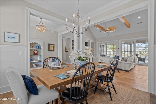 5151 Creswell Dr, Leland, NC 28451 - dining area featuring a chandelier, wood finished floors, ornamental molding, and ceiling fan
