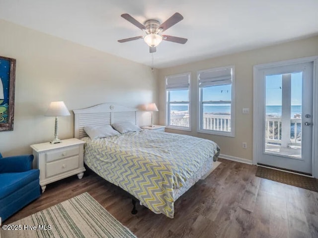 bedroom featuring access to exterior, ceiling fan, baseboards, and dark wood-style flooring