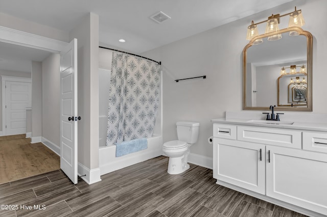 full bathroom with visible vents, toilet, shower / tub combo with curtain, wood tiled floor, and vanity