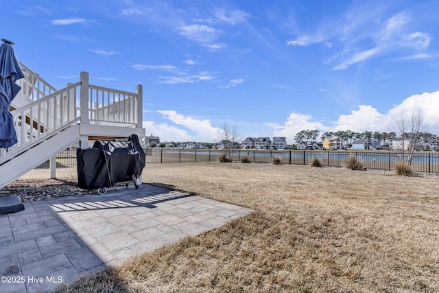 view of yard with a patio and fence