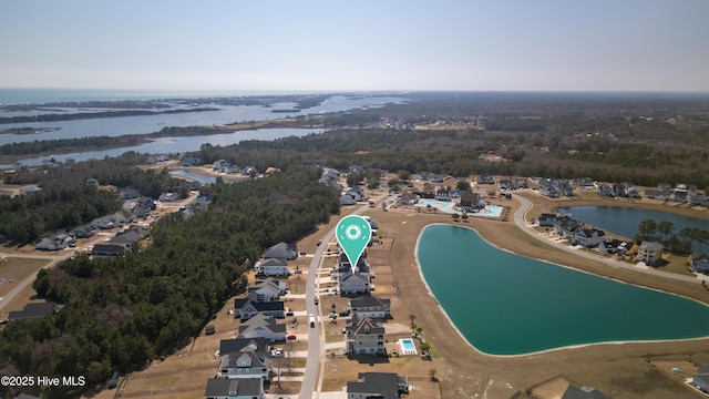 birds eye view of property featuring a water view