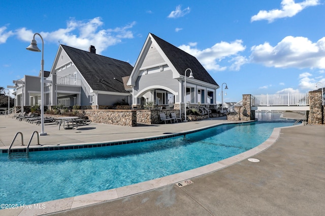 pool featuring a patio