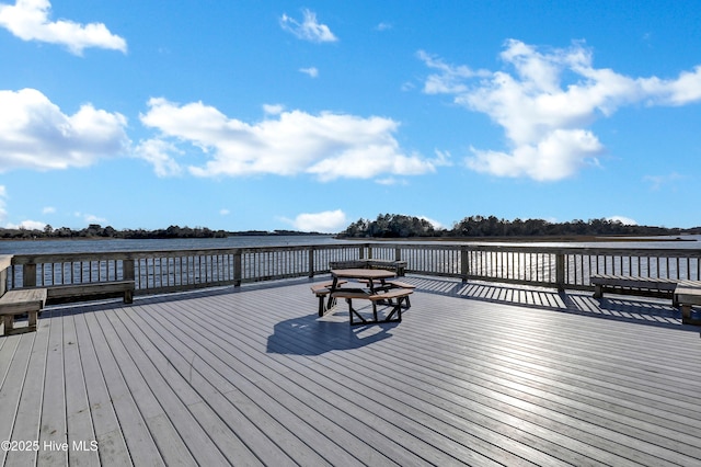 deck featuring a water view