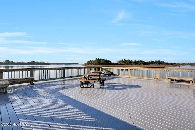 dock area featuring a water view