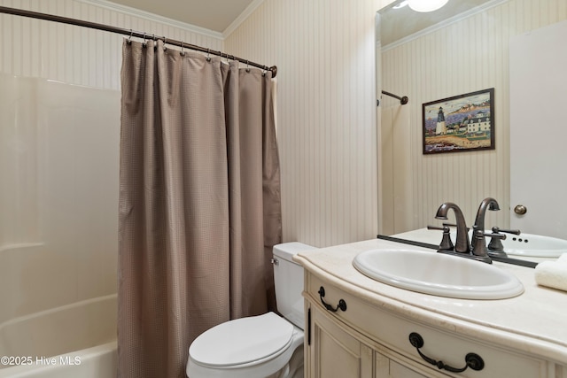 bathroom with toilet, ornamental molding, shower / tub combo, wallpapered walls, and vanity