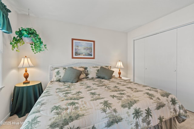 carpeted bedroom with a closet