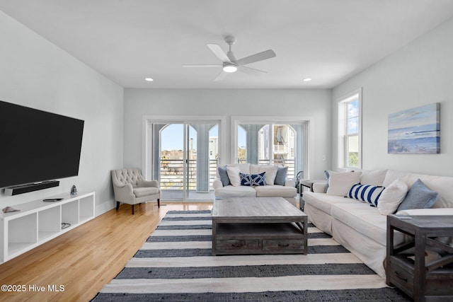 205 Fayetteville Ave Unit 1, Carolina Beach, NC 28428 - living room with wood finished floors, a ceiling fan, and recessed lighting