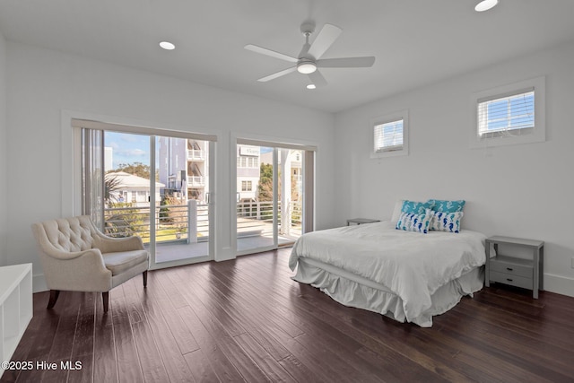 205 Fayetteville Ave Unit 1, Carolina Beach, NC 28428 - bedroom featuring access to exterior, dark wood-type flooring, multiple windows, and recessed lighting