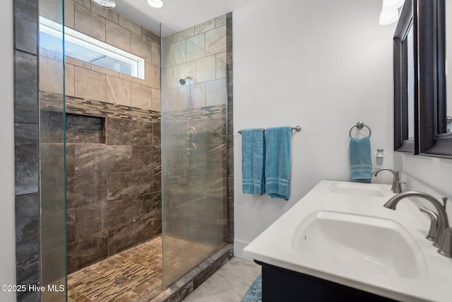 205 Fayetteville Ave Unit 1, Carolina Beach, NC 28428 - bathroom with a tile shower and double vanity