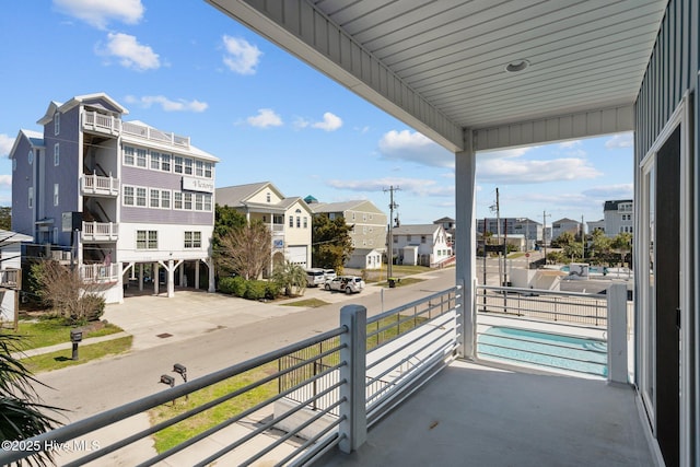 205 Fayetteville Ave Unit 1, Carolina Beach, NC 28428 - balcony featuring a residential view