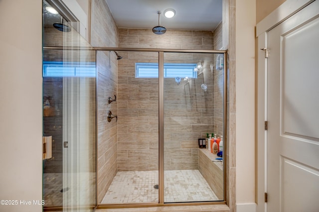 bathroom featuring a stall shower