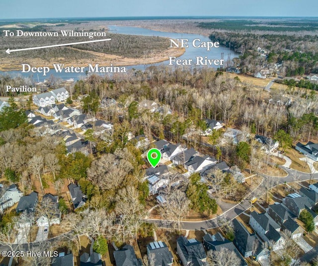 bird's eye view featuring a residential view and a water view