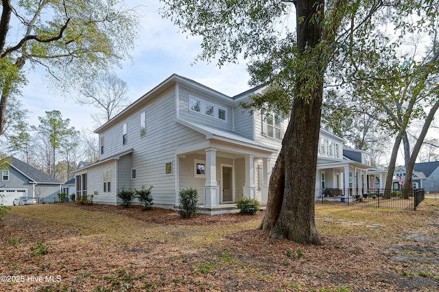 view of front of house with fence