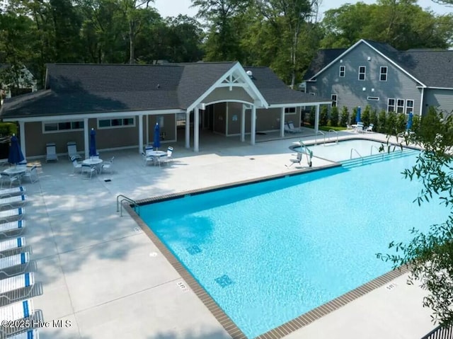 community pool featuring a patio