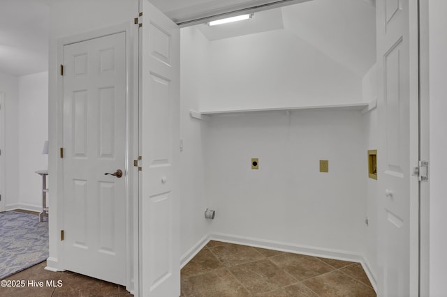 clothes washing area featuring electric dryer hookup, baseboards, hookup for a washing machine, and laundry area