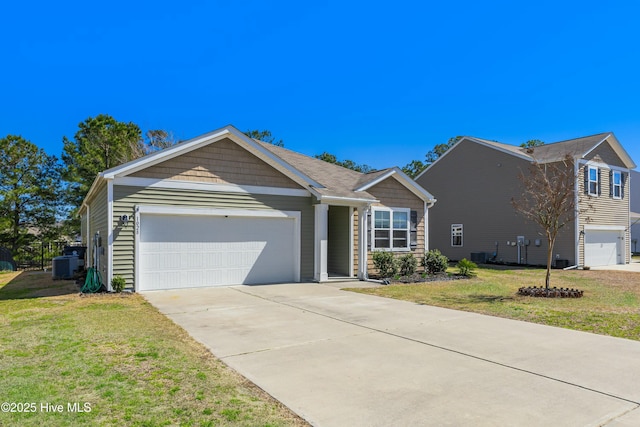 single story home featuring a garage, central air condition unit, concrete driveway, and a front lawn