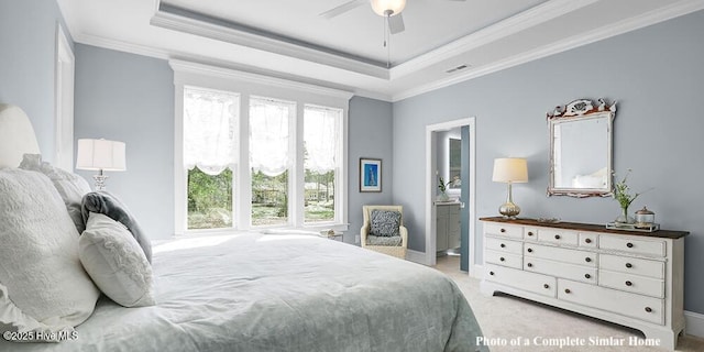 2760 Alvernia Dr, Castle Hayne, NC 28429 - bedroom with light carpet, crown molding, a tray ceiling, ensuite bathroom, and a ceiling fan
