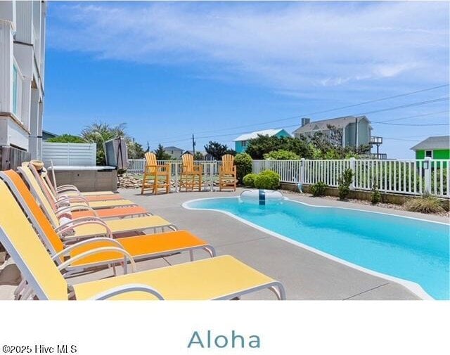 view of pool featuring a patio area, a fenced in pool, and a fenced backyard