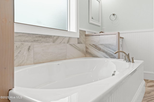 449 E Fourth St, Ocean Isle Beach, NC 28469 - full bathroom with a bath and wainscoting