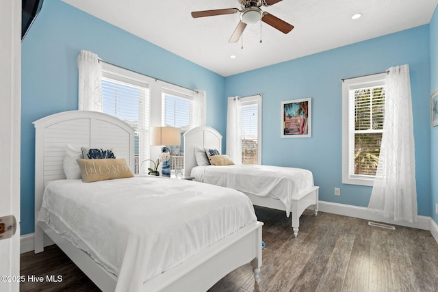 449 E Fourth St, Ocean Isle Beach, NC 28469 - bedroom with baseboards, wood finished floors, recessed lighting, and a ceiling fan
