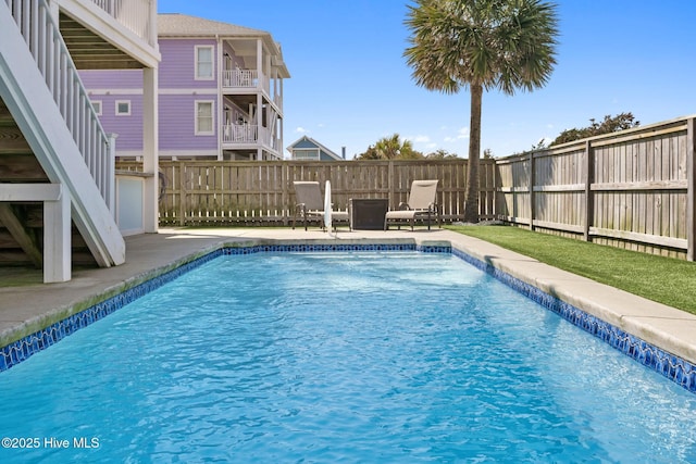 449 E Fourth St, Ocean Isle Beach, NC 28469 - view of swimming pool with a fenced backyard and a patio