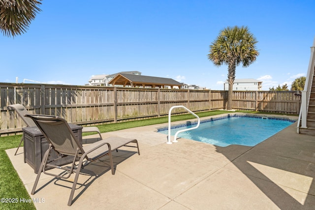 449 E Fourth St, Ocean Isle Beach, NC 28469 - view of pool featuring a patio and a fenced backyard