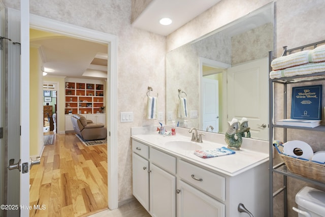 bathroom featuring vanity and wood finished floors