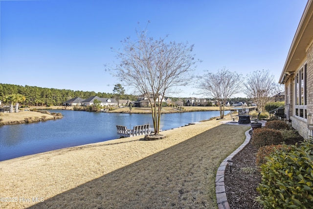 view of yard with a water view