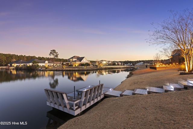 view of dock with a water view