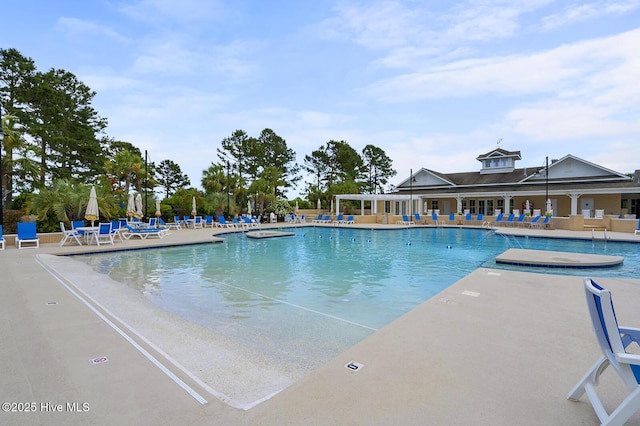 community pool with a patio