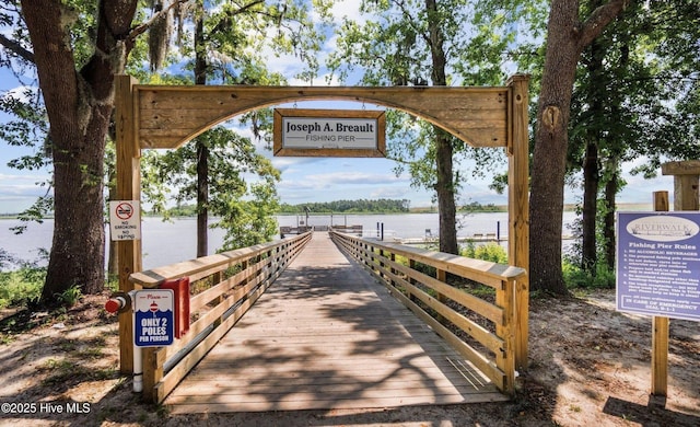 view of home's community with a water view