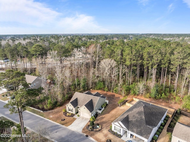 bird's eye view featuring a view of trees