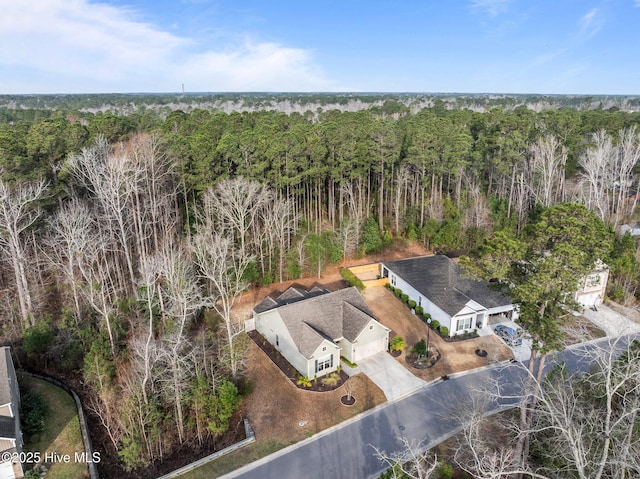 aerial view with a wooded view