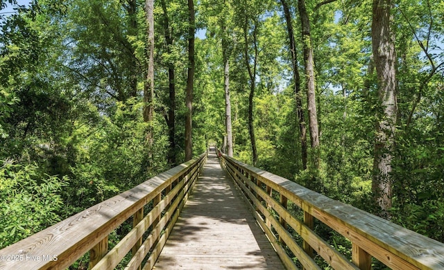 view of property's community with a view of trees