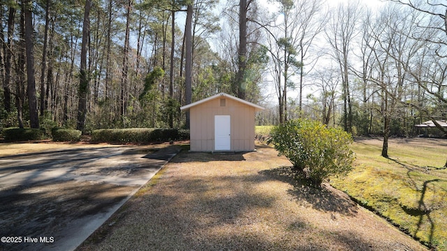 exterior space featuring a view of trees