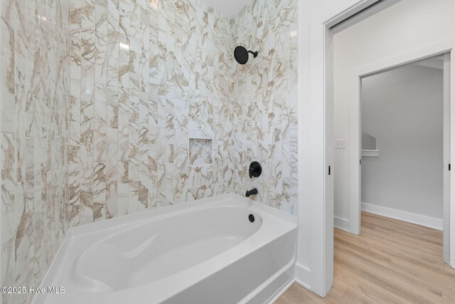 304 Alabama Ave Unit 2, Carolina Beach, NC 28428 - bathroom featuring wood finished floors and baseboards