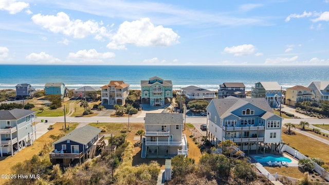 bird's eye view with a residential view and a water view