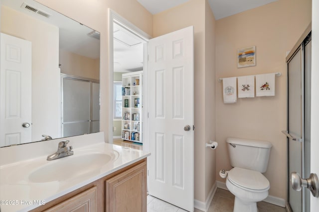 bathroom featuring visible vents, toilet, a stall shower, tile patterned flooring, and vanity