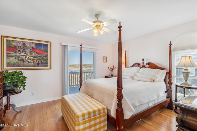 bedroom with ceiling fan, baseboards, light wood-style floors, and access to exterior