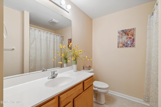 bathroom with visible vents, toilet, tile patterned flooring, baseboards, and vanity