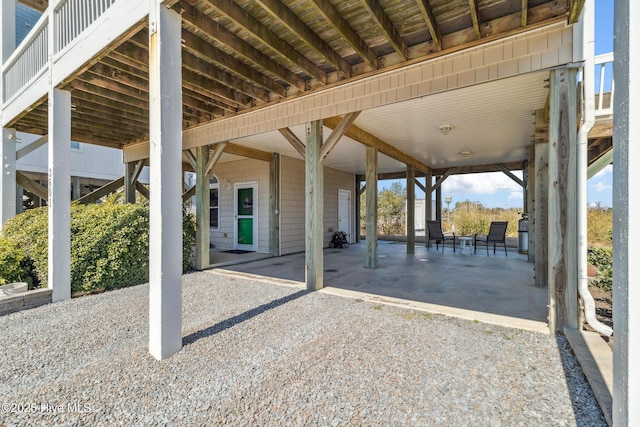 view of patio / terrace with a carport