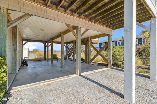 view of patio / terrace featuring stairs