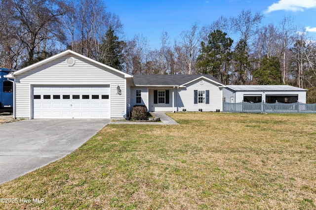 ranch-style home with a garage, a front yard, driveway, and fence