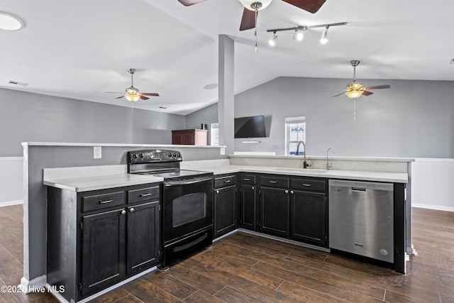 kitchen with visible vents, black range with electric cooktop, dark cabinets, stainless steel dishwasher, and a sink